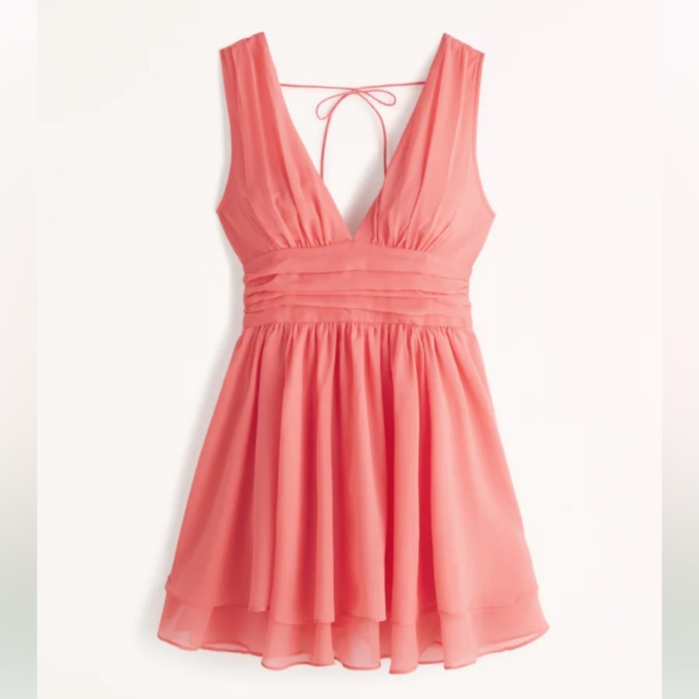 BRAND NEW! Flirty Drama Mini Dress